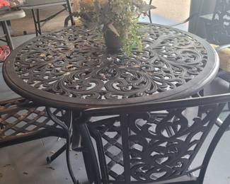 Wrought iron outdoor table & chairs