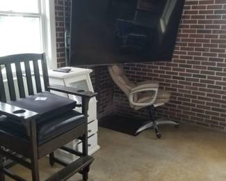 Large TV; executive chair