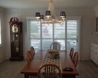 Dining table seats 8 - extra chairs available. Grandfather clock
