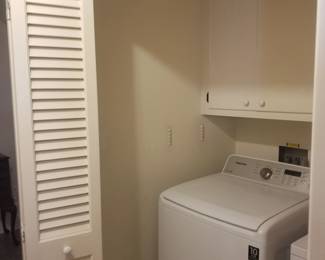 Louvered bi-fold doors & laundry cabinets 