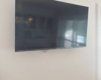 Flat screen TV with wall mount
