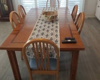 Dining table seats 8 - extra chairs available