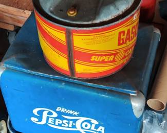 Metal pepsi cooler, metal gas cans, oil cans, garage of machine repairman