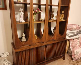 I've fallen in love with this Broyhill Brasilia furniture. I've done a little research and learned that this walnut furniture was introduced at the 1962 World's Fair. It has remained popular since then. 