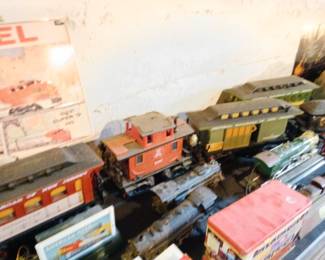Model trains including 1949 lion steam engine cast iron, jim beam set, and other vintage sets