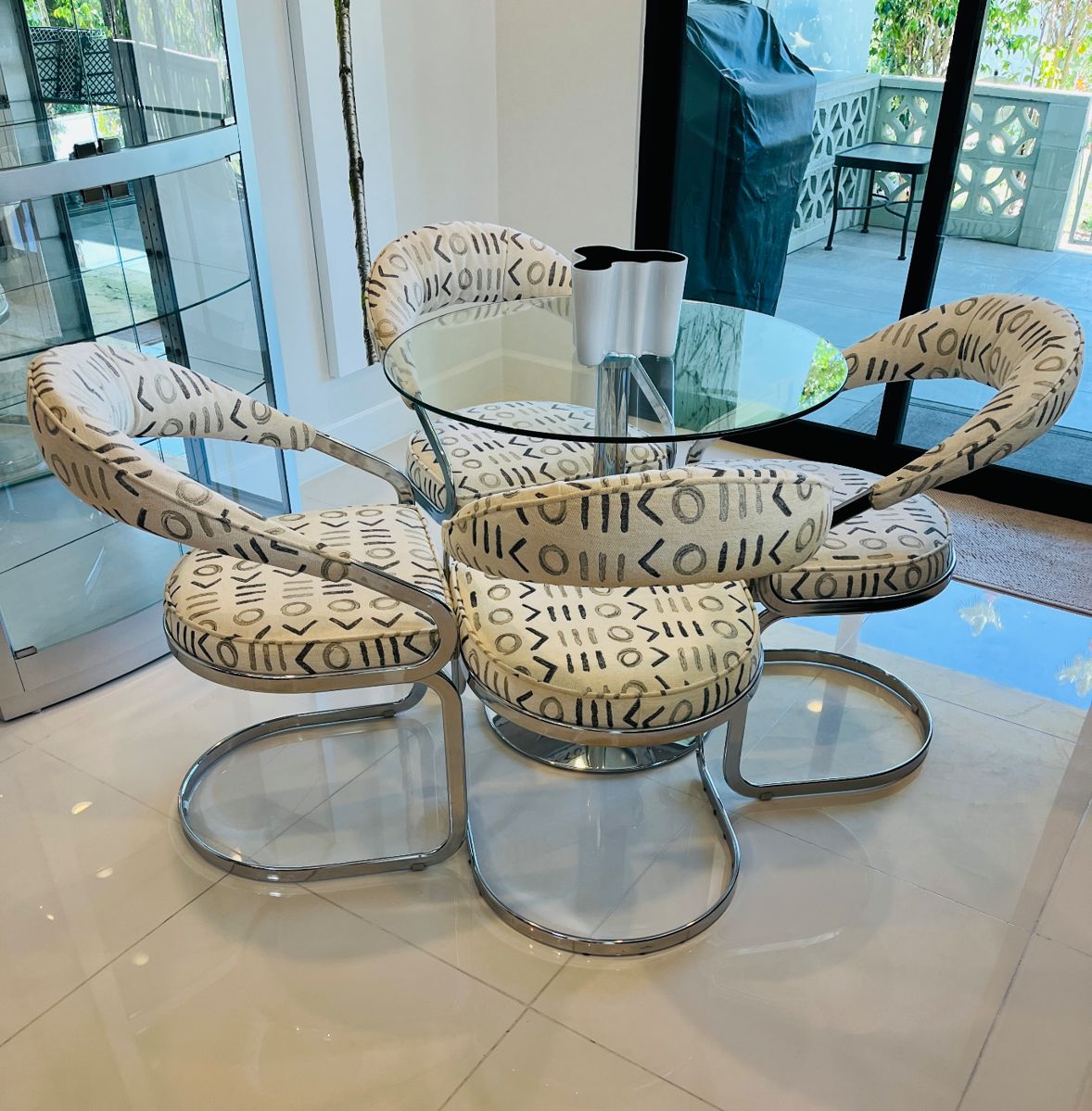 fab chrome dinette set. original purchase 1980s--we think van der Rohe but can't be sure. Table 32" diameter. PRICE $1,250