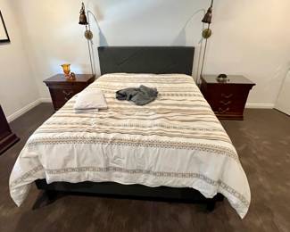 Queen bed including gray flannel headboard