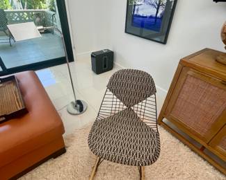 We have a PAIR of 1st generation Charles and Ray Eames for Herman Miller Black Steel and Birch RKR Bikini Rockers circa 1951. Amazing shape. Asking $3,250 for the pair.