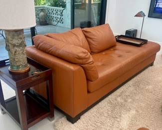 We have 2 leather chaises in this pretty Havana brown color. They measure about 88" long x 36" deep. Asking $450 each. The ottoman is about 38" square. Asking $200