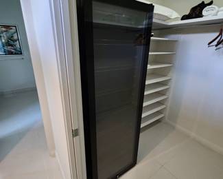 Large tall wine cooler. Works well!