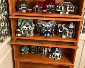 Barrister Bookcase with Vitrum Vitreville stained glass collectibles.