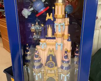 Official Walt Disney World 50 year celebration castle playset. Never opened with the box still sealed.                                                         
Includes: 5 Figures, Light Up Castle, 2 Attraction Monorail, ride, Elevator Stage, Base for Rides.  Rare opportunity.