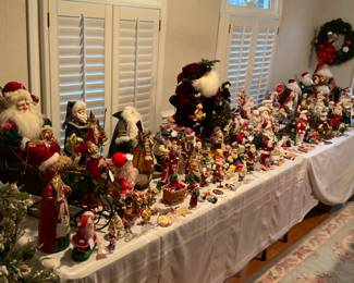Hugh display of Santas and Christmas items to include Lynn Haney Santas, Mark Roberts Fairies and Chelsea Fair Santa.  Not to mention 2 60" Santas.