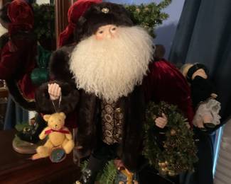 Chelsea Fair "Forever Christmas" Santa.  This Chelsea  Santa figurine is a limited edition piece. Standing at 24 inches tall, it is perfect to add to your collection or decorate your home during the holiday season. The multicolor Santa is beautifully designed with a detailed outfit.