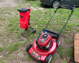 Lawnmower and shredder sold separately