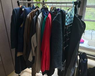 Assorted clothing including several t-shirts