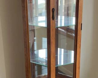 Oak finish curio cabinet