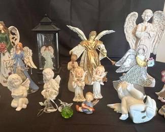 Assorted Angel Statues, Christmas Decorations And Tree Topper