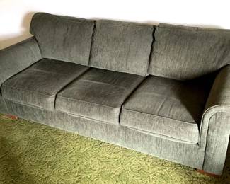 Green upholstered sofa 