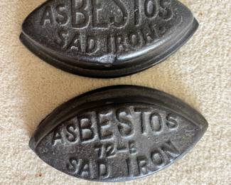 Two Asbestos Sad Iron Cores
