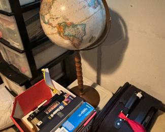 Standing globe, games and luggage