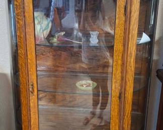 Antique tiger maple display cabinet