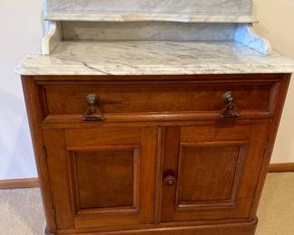 Marble top commode. No chips. Heavy and sturdy. 