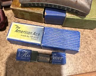 Set of 4 harmonicas in original boxes. 
