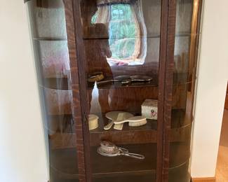 Vintage Claw footed original curved glass oak curio cabinet. Circa 1800’s. 