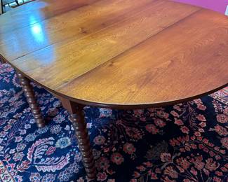 Turned leg drop leaf dining table. Beautiful shape. Sturdy. 