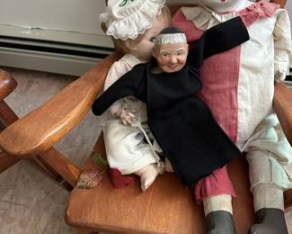 Lots of dolls. Ceramic headed and hands. Original paint, Victorian Gibson girl models too. 