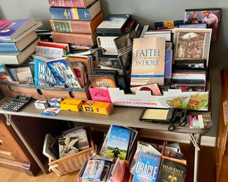 Lots of books lots of books this section religion books and tapes and DVDs
2 for $1