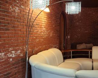 Chrome arc floor lamp with faux crystals.
