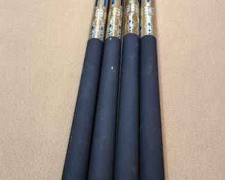 Blue and gold fiberglass pool cues