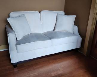 2 Seat off white fabric sofa (small stain on the one seat so please see photo