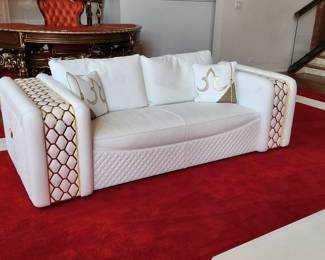 Formenti White Leather 2 Seat Sofa with Gold Tone Accents. Retail tags are still attached.