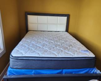 Gray wood frame and white faux leather headboard, footboard and side rails only.