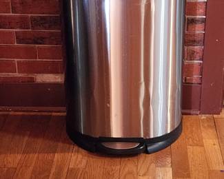 Stainless garbage can. Has few small dings.