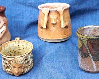 FACE POTTERY MUGS