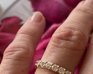 A- $360 - 1/2 ctw, 7 diamonds on 14kt gold band. 1.9 gr. sz 7 