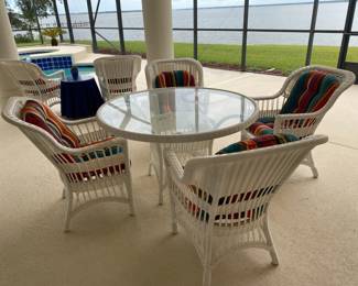 #29 $480 white wicker all weather table and 6 chairs