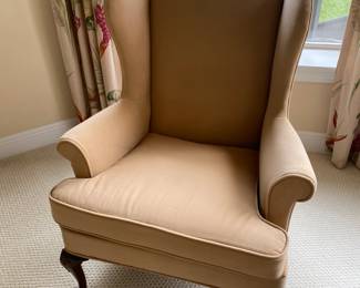 #37 $100 each two tan velvet wing back chairs