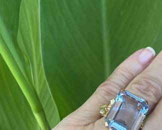 D- $475 - Emerald cut blue topaz on 10kt yellow gold Art Deco setting. 10.4 grams (size 6 3/4)