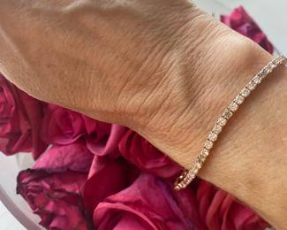 H- $450 Multi colored stones bracelet on 14kt yellow gold. 10.1 gr. 7 1/2"Long. 