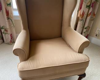 #37 $100 each two tan velvet wing back chairs