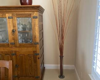 #8 $50 glass vase with wood sticks 80” high to the top