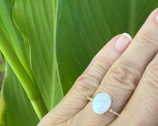 E- $150. Round Opal ring 10kt yellow gold setting 1.6 grams size 6 3/4