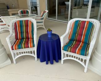 #29 $480 white wicker all weather table and 6 chairs