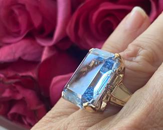 D- $475 - Emerald cut blue topaz on 10kt yellow gold Art Deco setting. 10.4 grams (size 6 3/4)