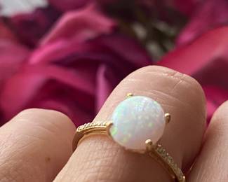 E- $150. Round Opal ring 10kt yellow gold setting 1.6 grams size 6 3/4